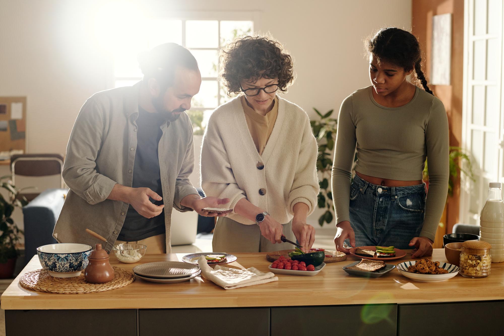 Gathering at studio table during a tasting workshop