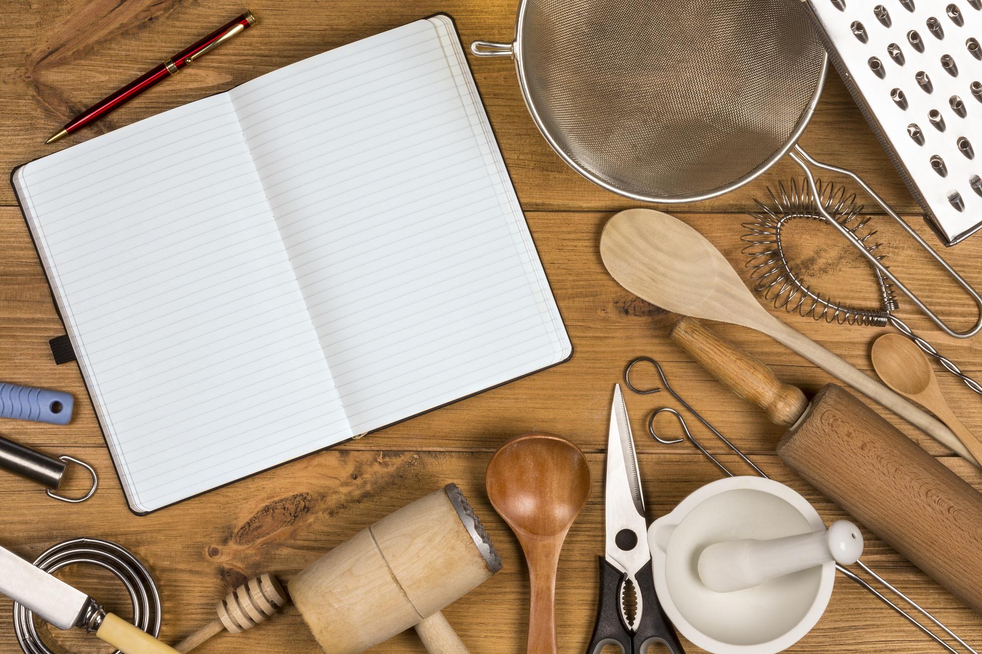 Workshop table with notebooks, timers and tasting spoons